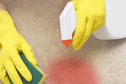 Carpet cleaner preparing a safe cleaning setup in a St Johns Wood property