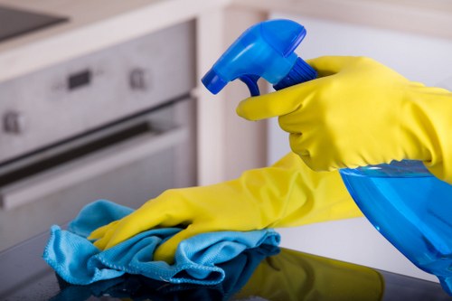 Professional carpet cleaning team working safely in a St Johns Wood home